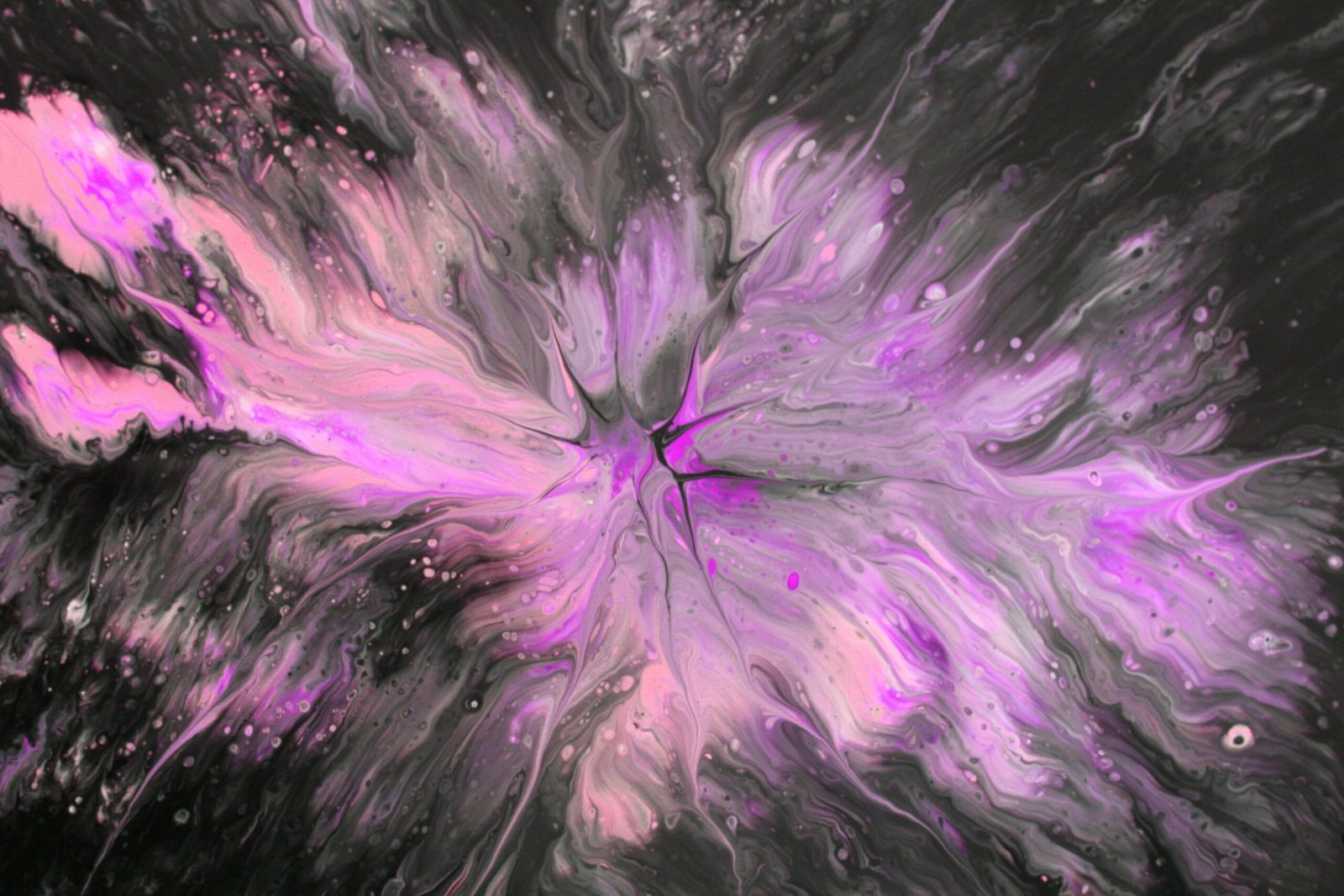 Abstract artwork featuring vibrant pink and purple swirling patterns, creating a dynamic visual impact.