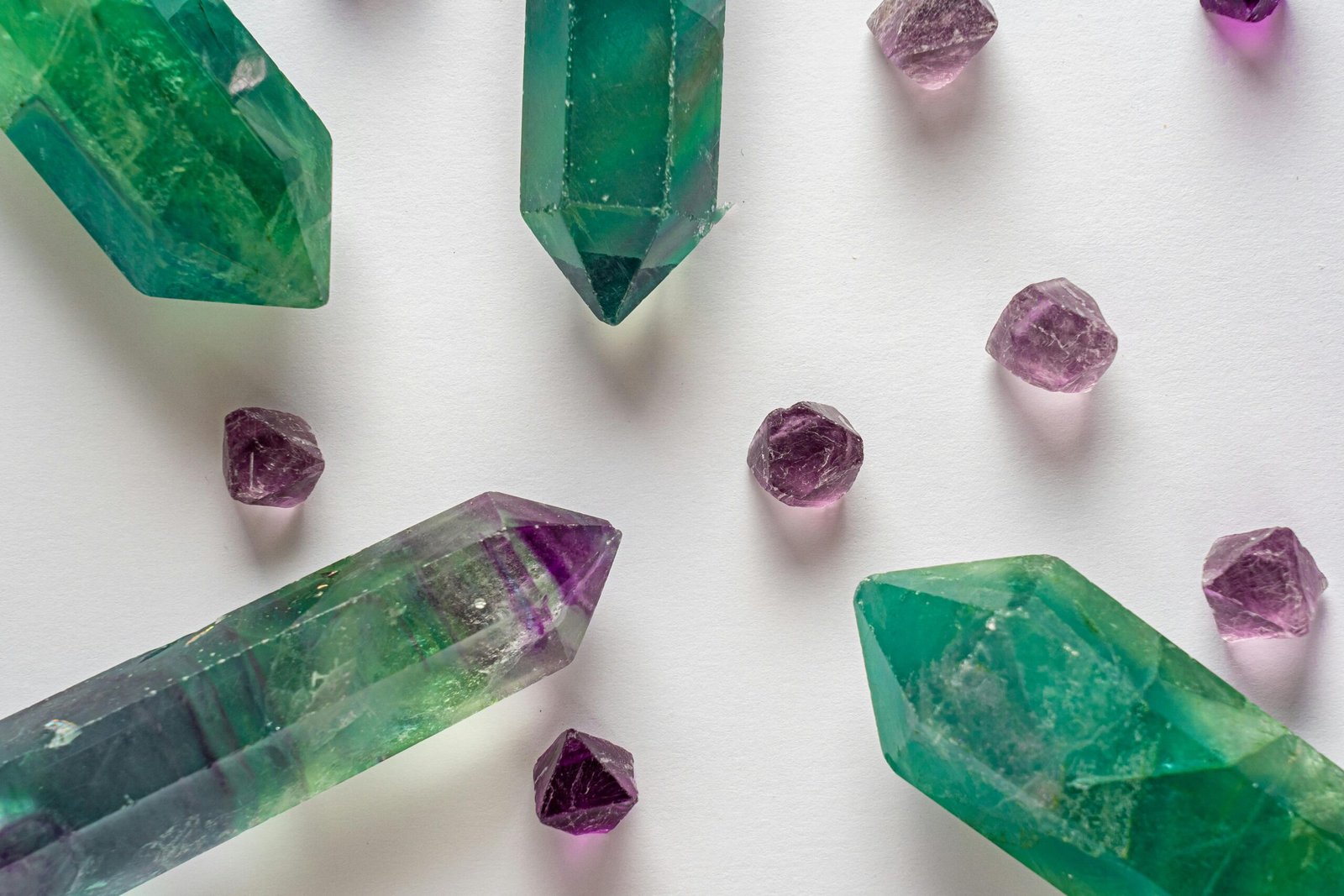 Close-up of vibrant green and purple crystals showcasing natural beauty and detail.